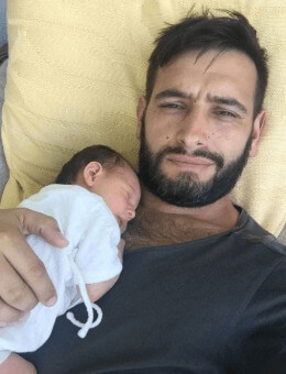 Dan Cadan With His Baby Daughter